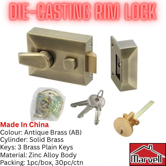 Antique brass die-casting rim lock with solid brass cylinder and three brass keys for wooden door security